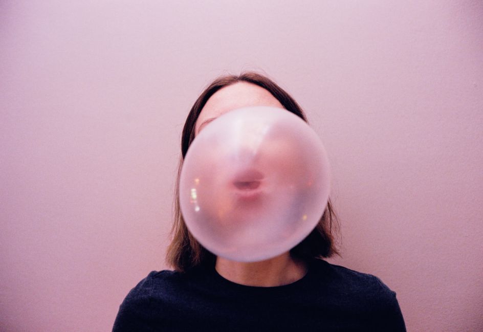 [A Straight-haired Woman Pops A Pink Bubblegum In Front Of A Pink Wall](https://www.stills.com/images/a-straight-haired-woman-pops-a-pink-bubblegum-in-front-of-a-pink-wall/307021) by Sean Hagwell